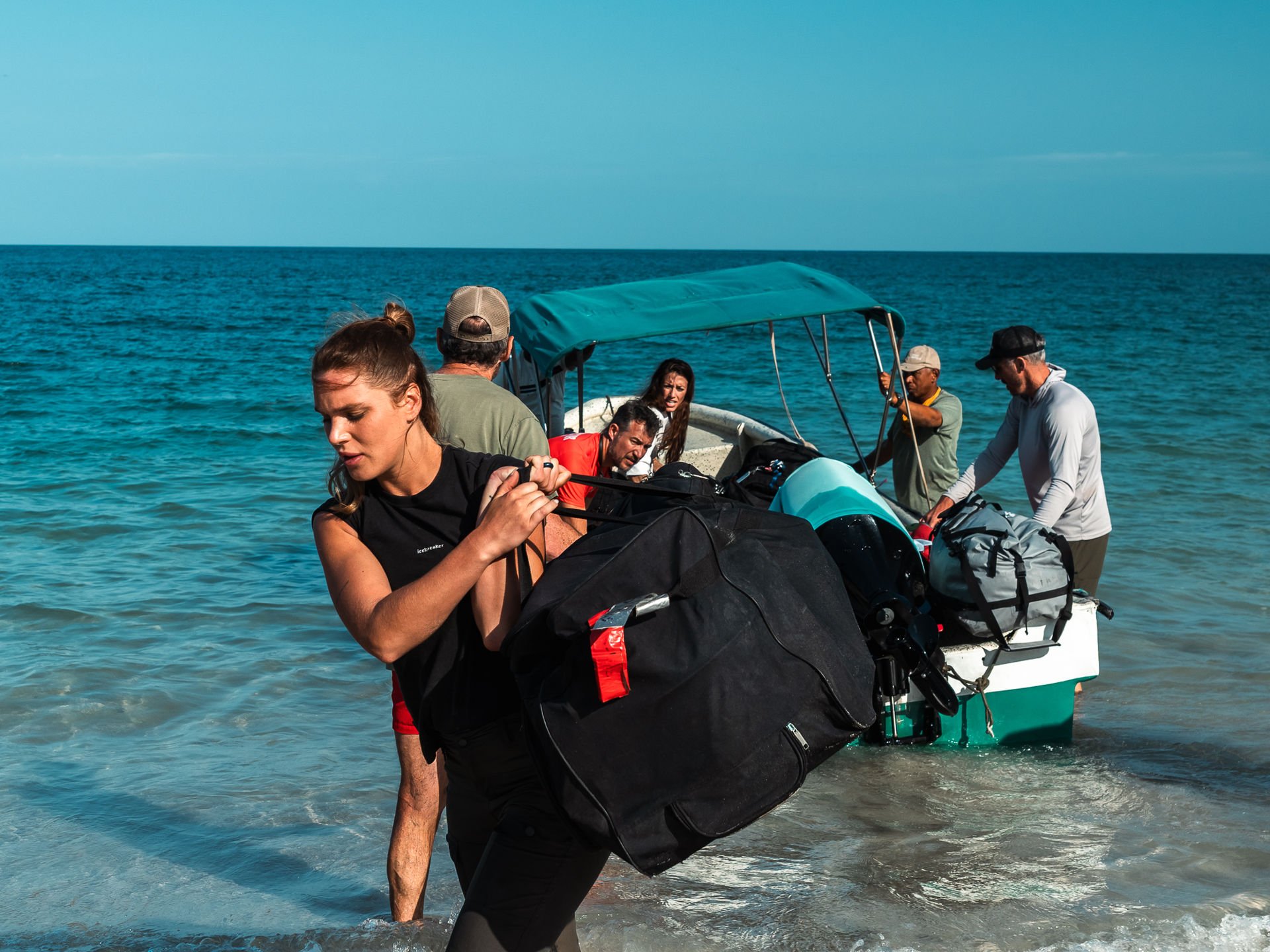 Man holding a freshly caught fish