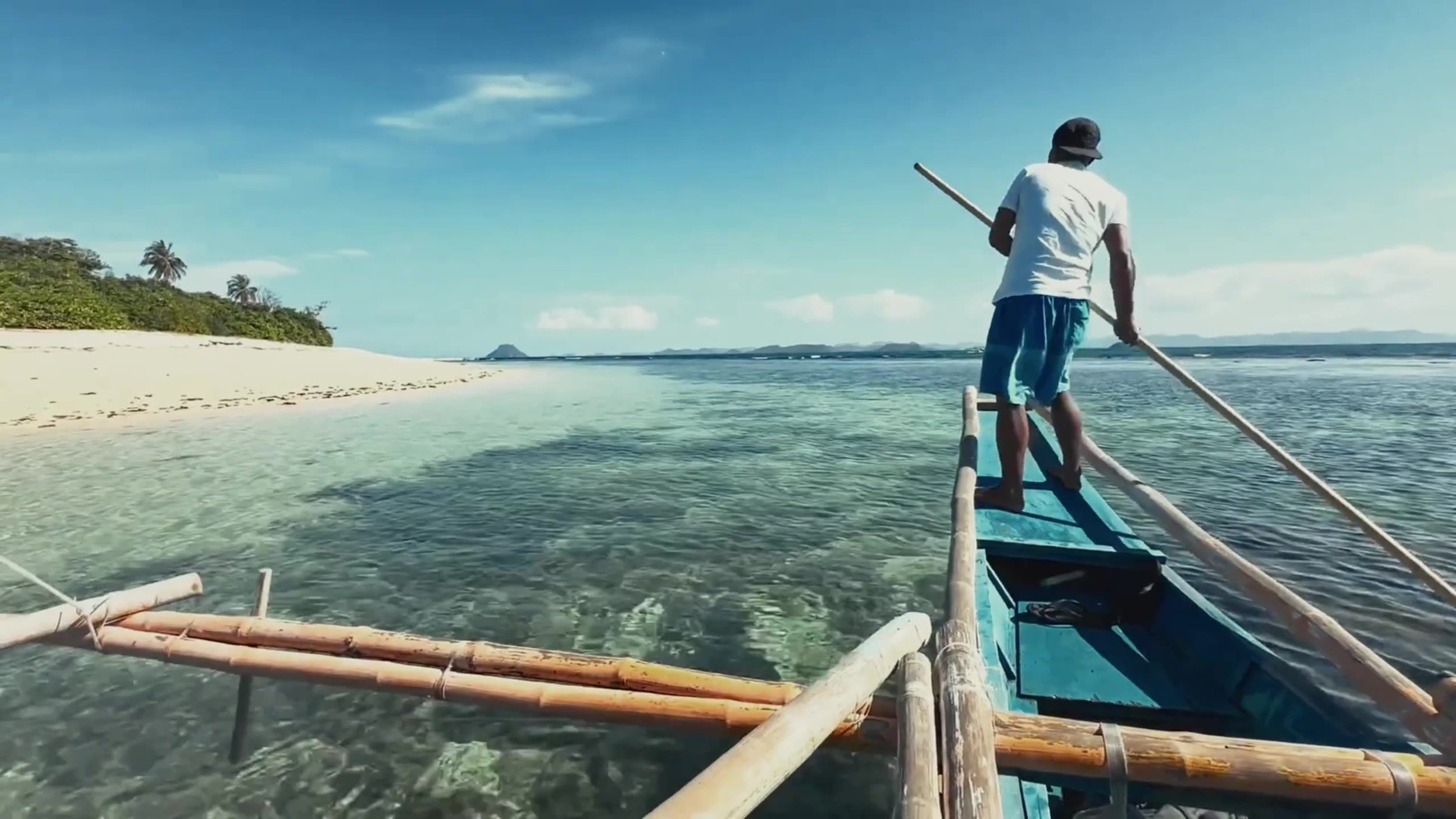 Approaching the island by traditional boat