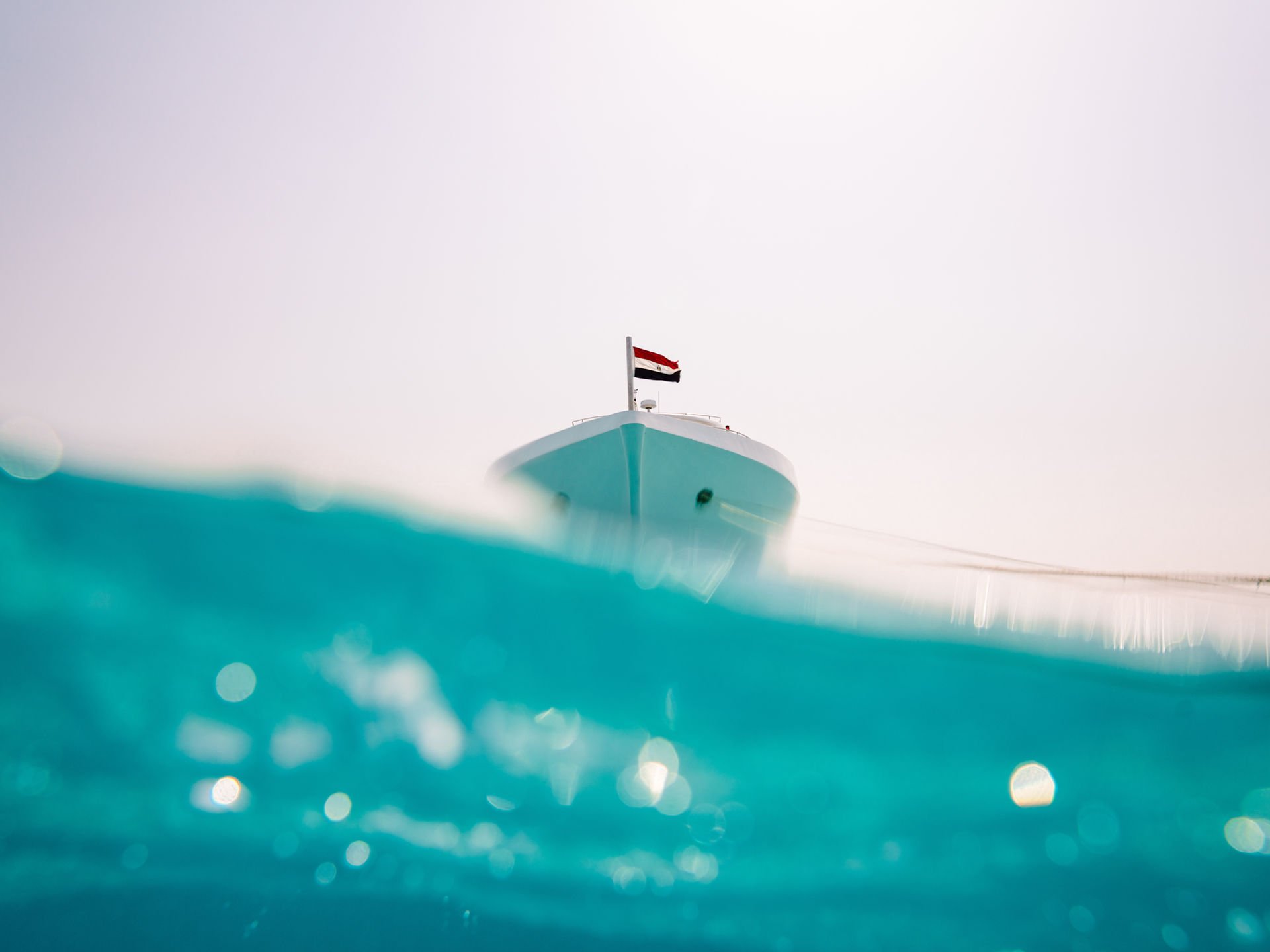Kitesafari yacht with kitesurfer in turquoise waters