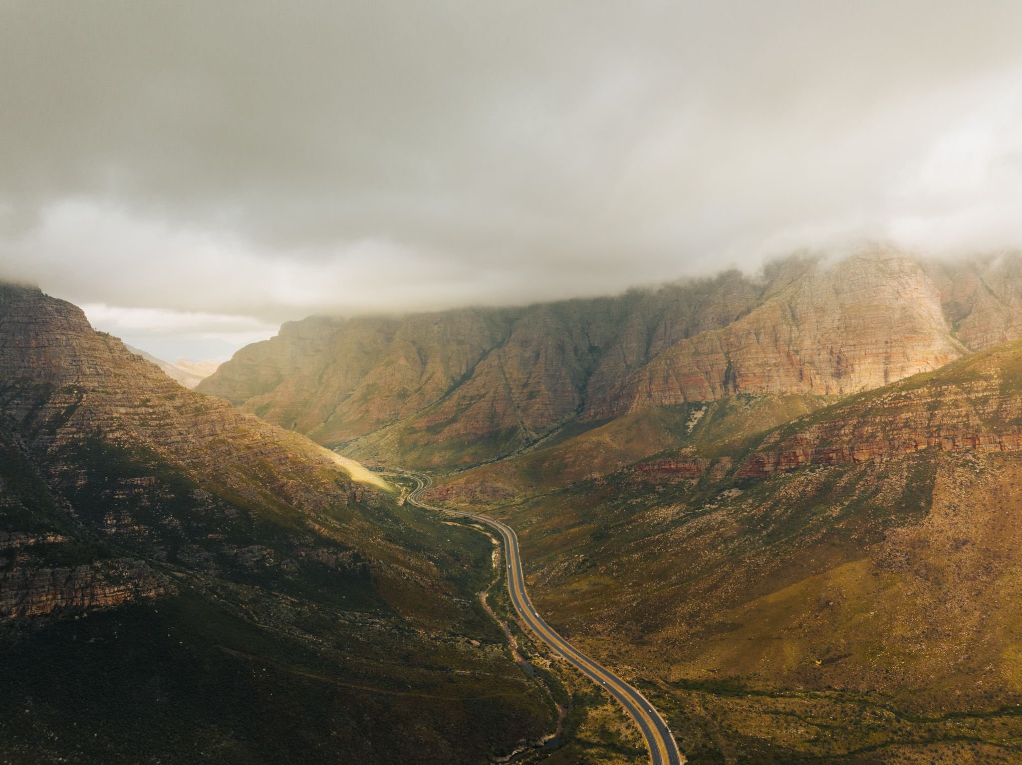 Cape Town mountain pass road through fog