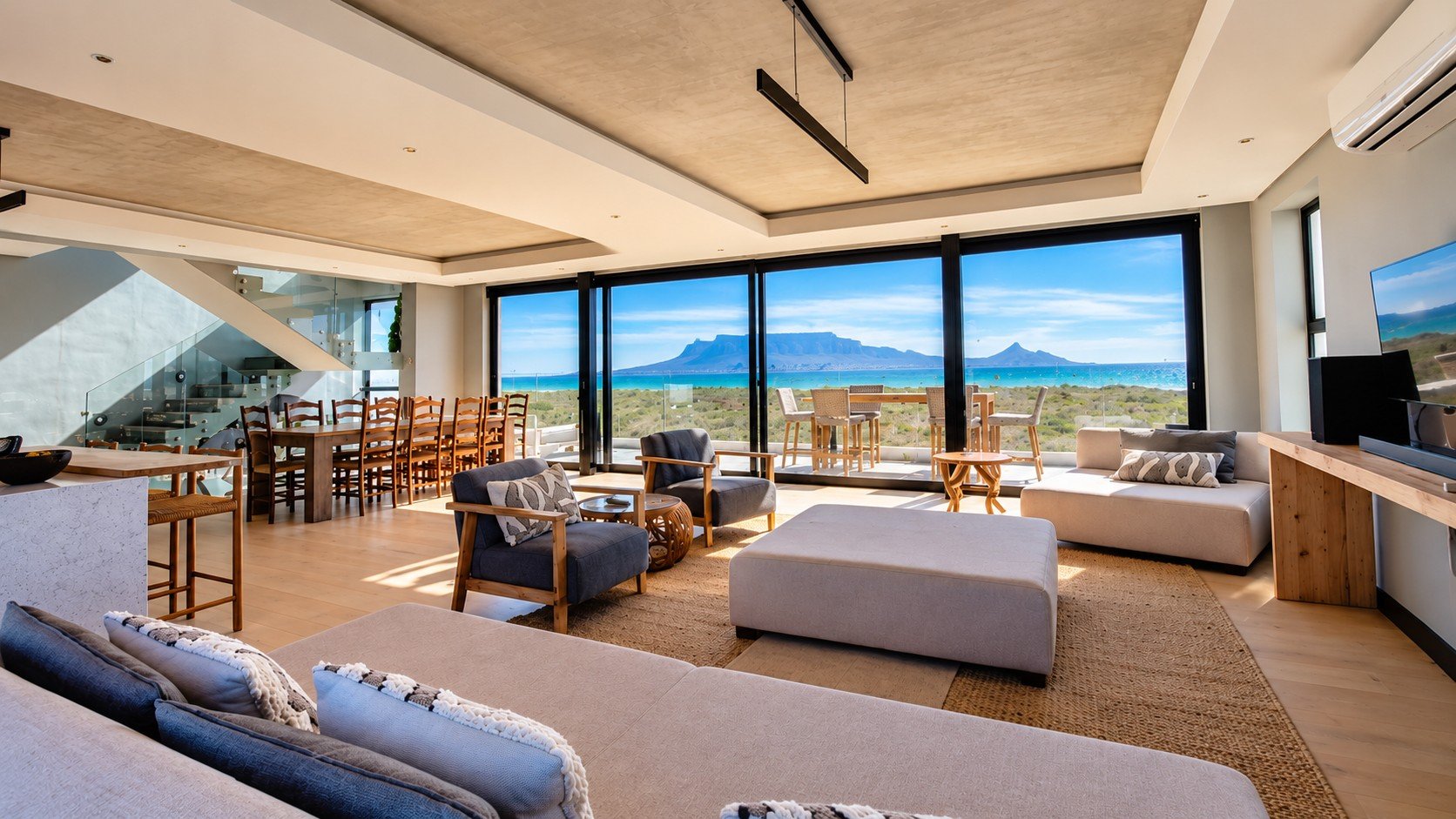 Sunset Beach Villa living and dining area with Table Mountain view