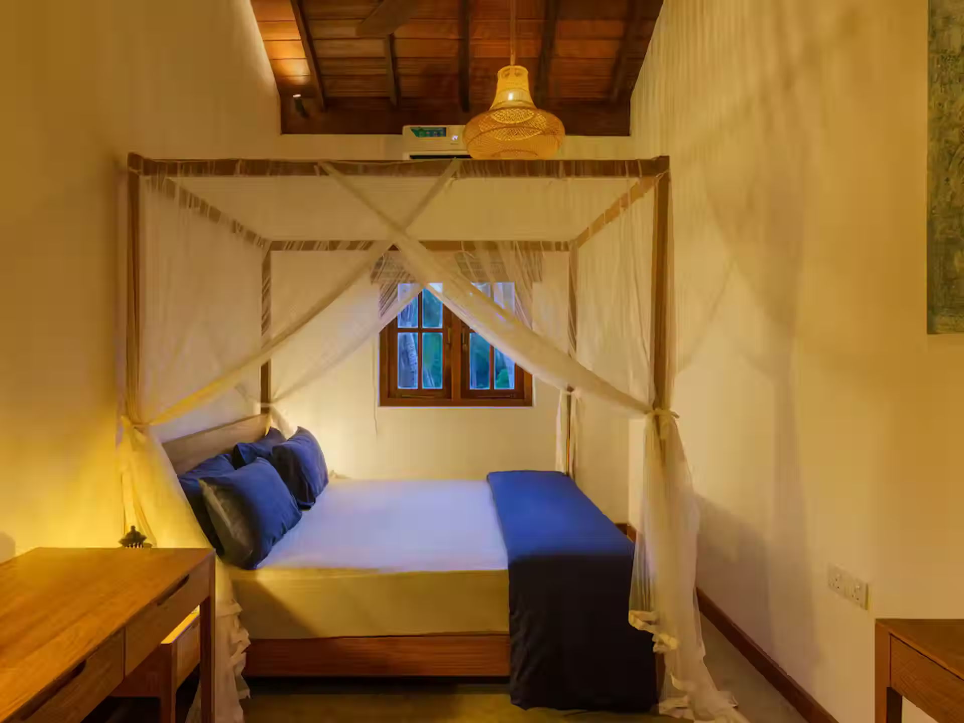 Kalpitiya villa bedroom with blue canopy