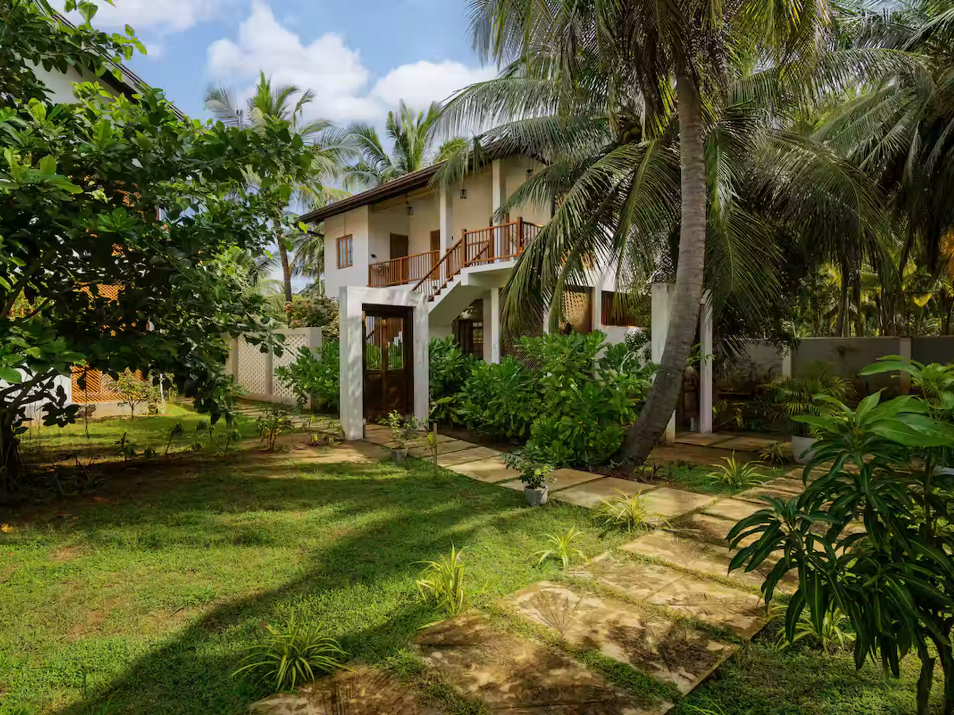 Kalpitiya villa exterior with tropical garden