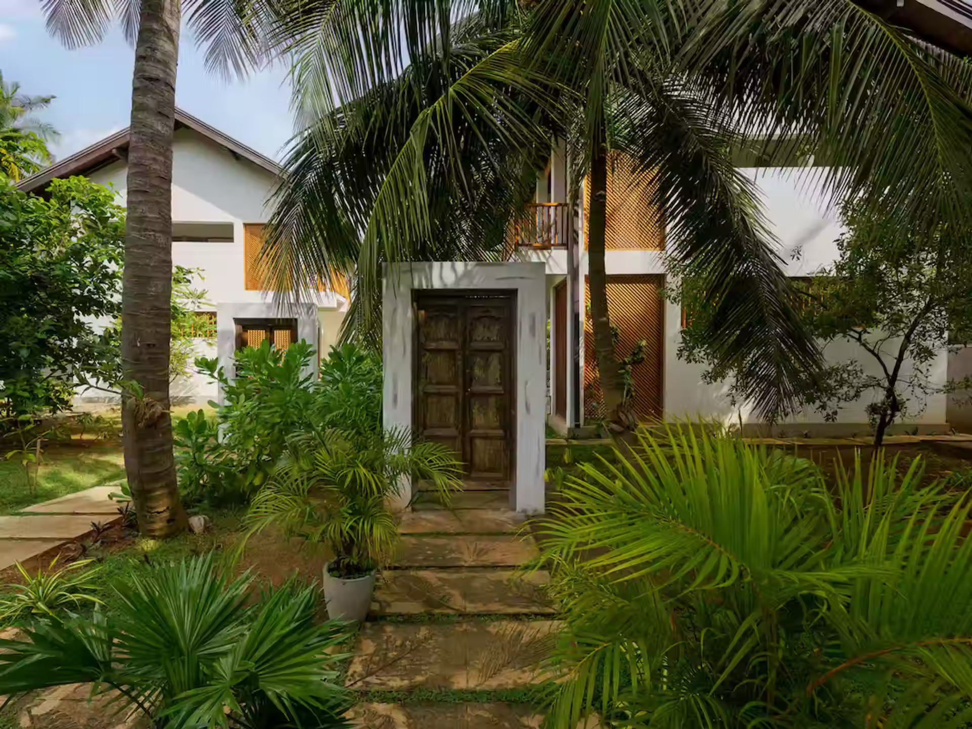 Kalpitiya villa entrance with palm trees
