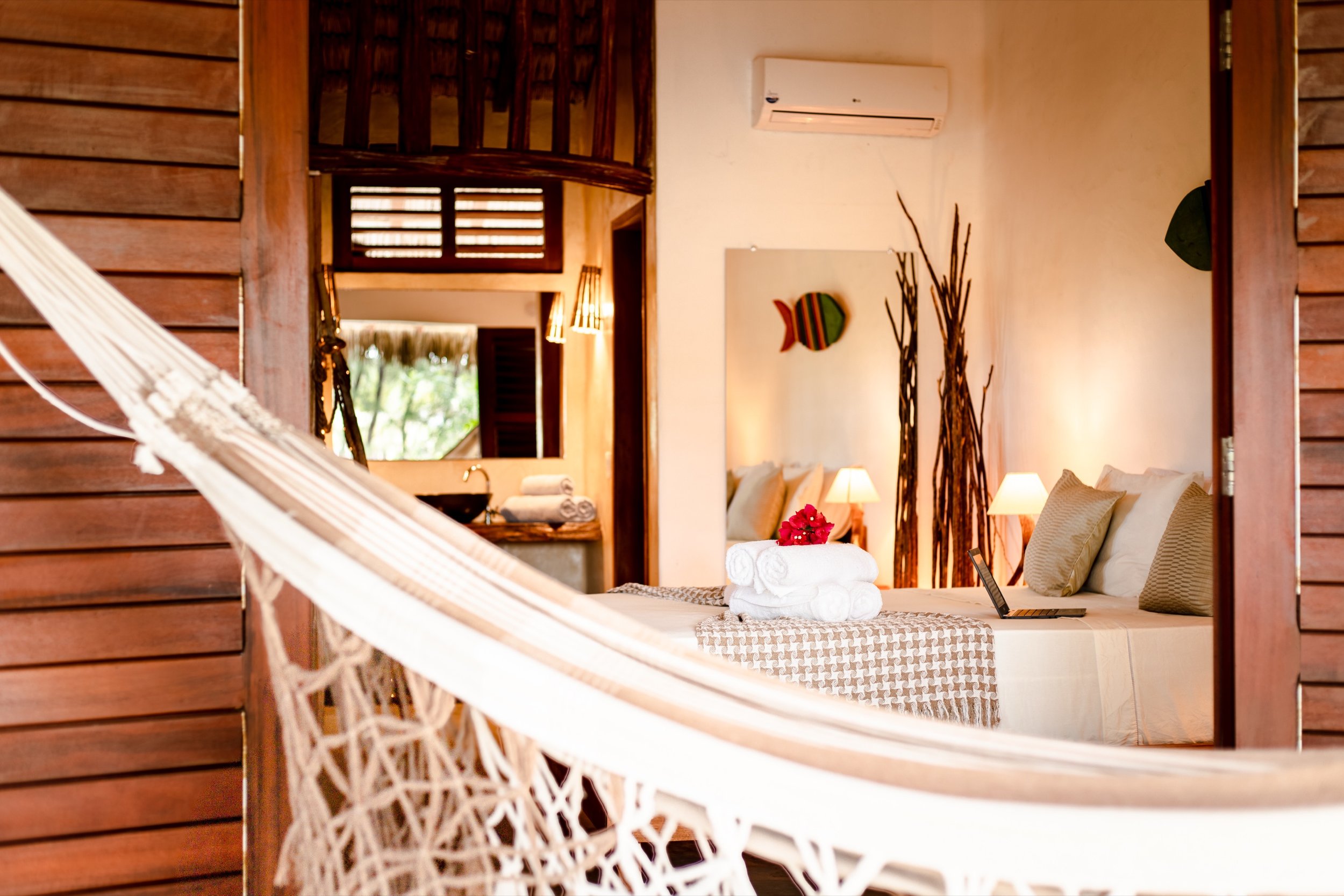 Prea villa bedroom with hammock on porch