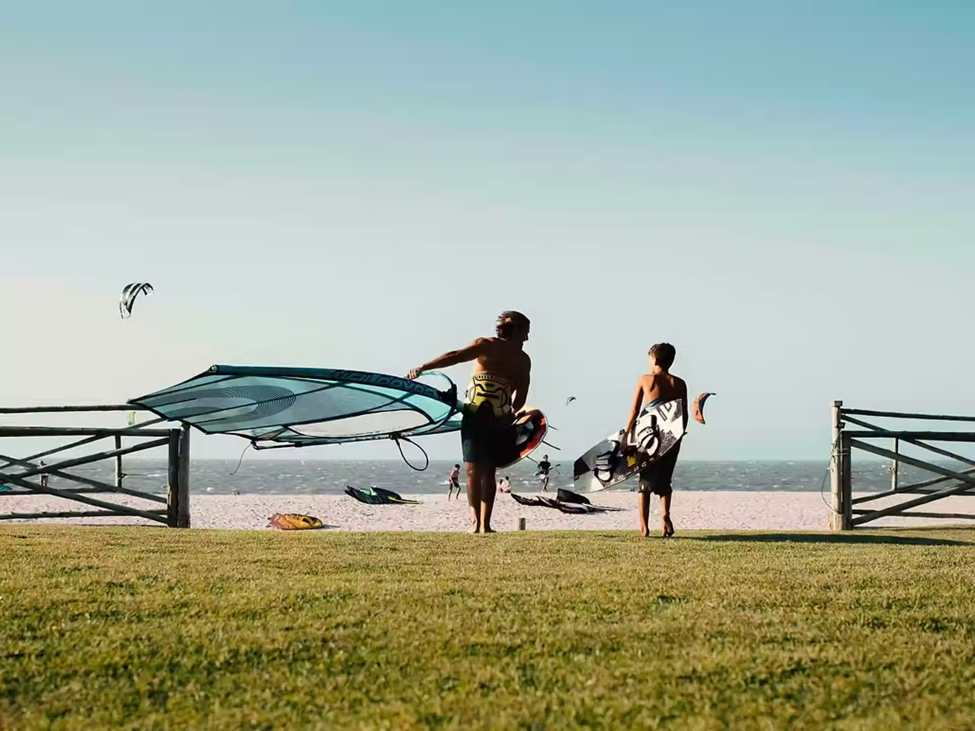 Prea friends on the beach at sunset