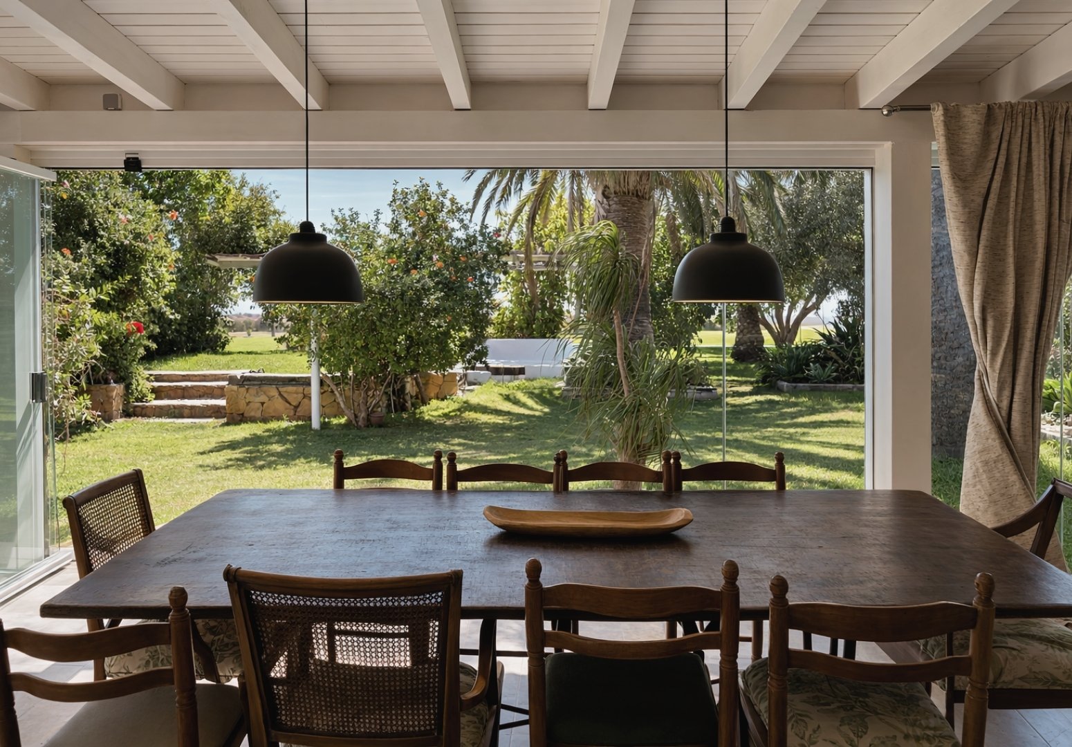Tarifa villa indoor dining with garden view