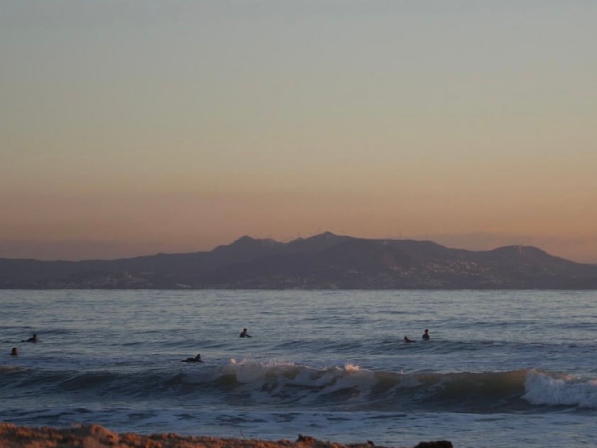 Tarifa surfer riding a barrel wave