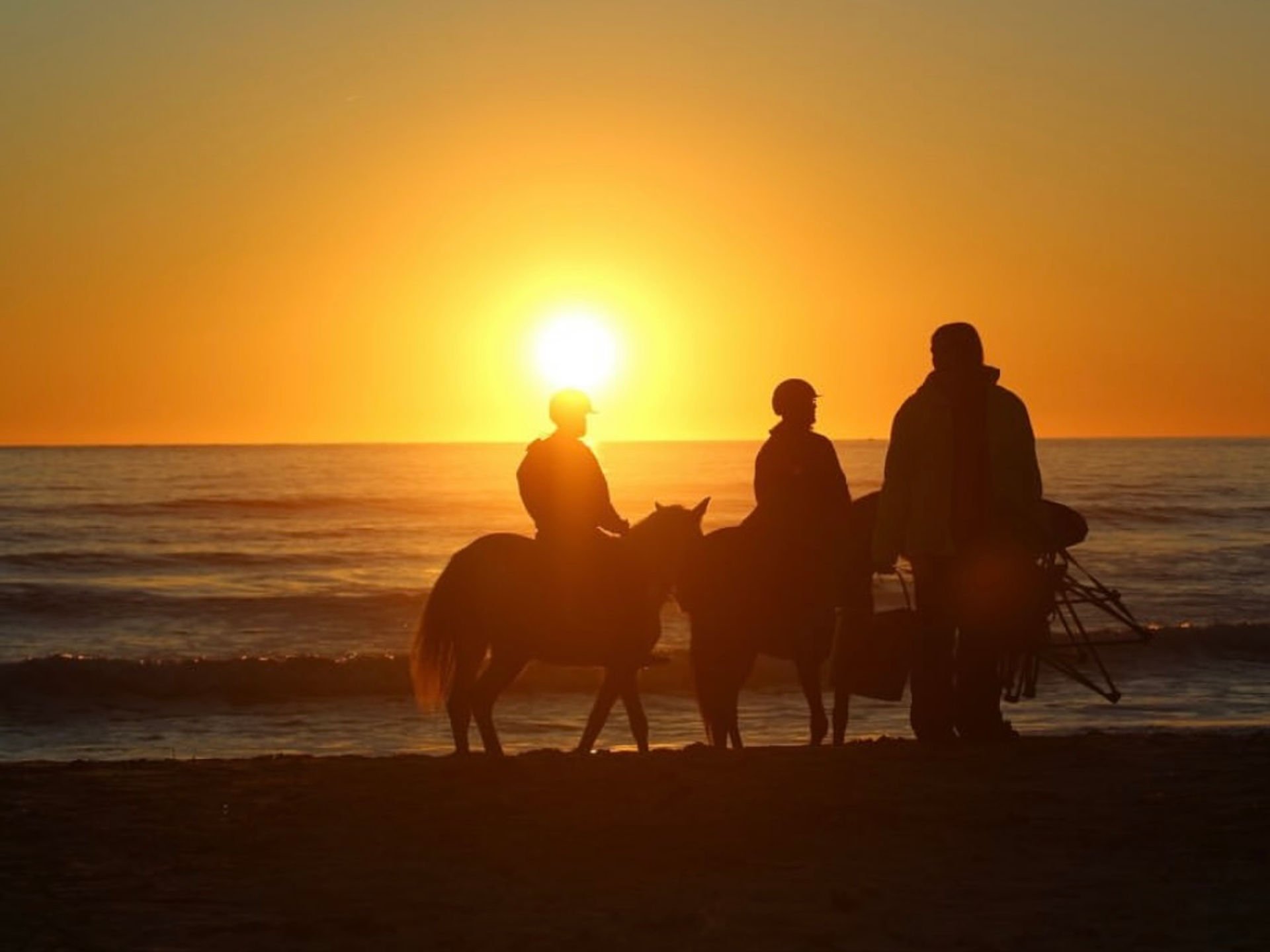 Tarifa windsurfer jumping waves