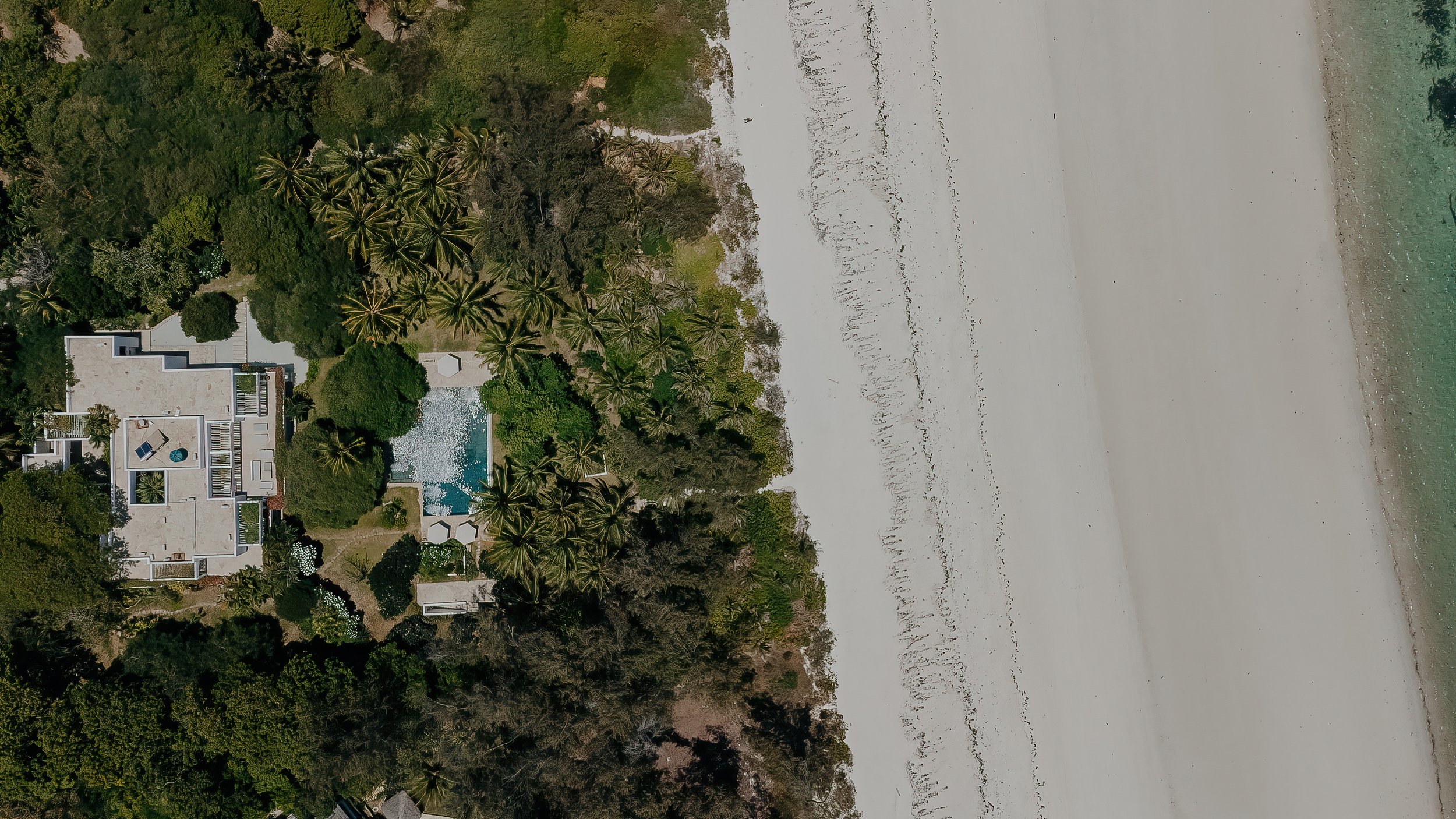 Top-down aerial of Watamu villa next to the beach