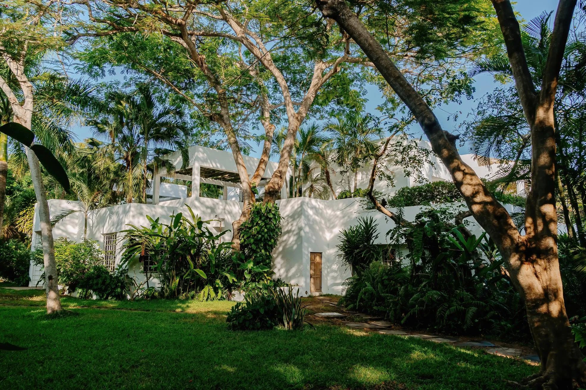 Watamu villa facade through tropical trees
