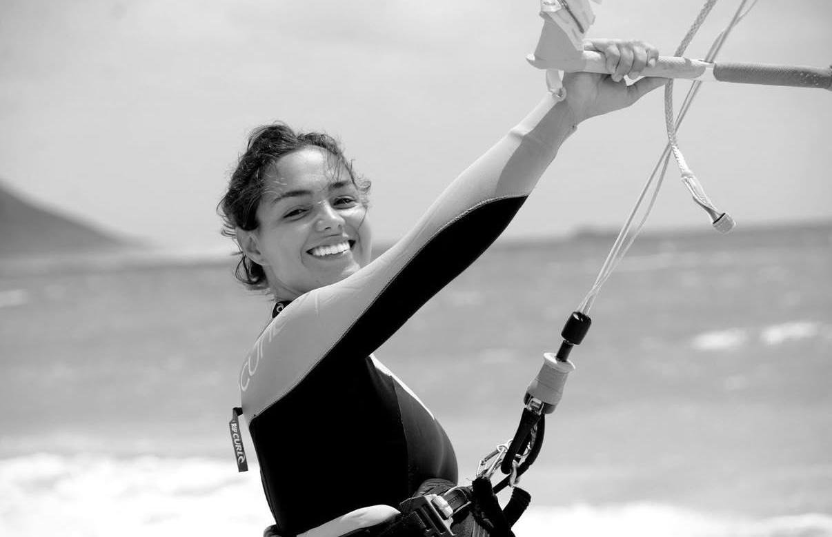 Paloma Asensio smiling while kitesurfing